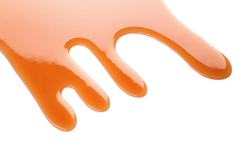 Delicious caramel sauce on white background