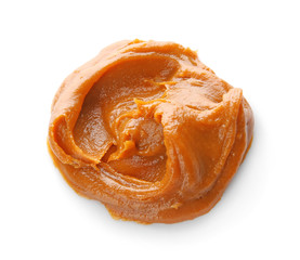 Delicious caramel sauce on white background