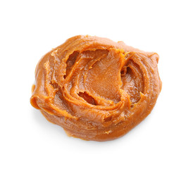 Delicious caramel sauce on white background