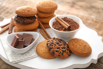 Composition with oatmeal cookies on table