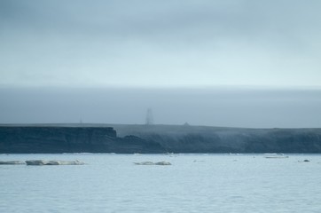 Rocks of the polar island in the Arctic Ocean
