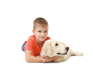 Cute little boy with dog on white background