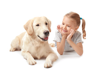 Cute little girl with dog on white background