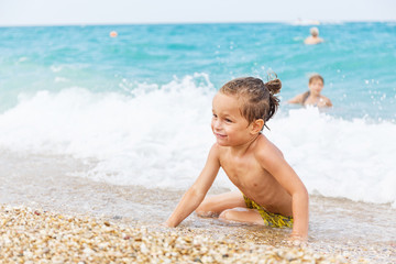 Beautiful boy and the sea