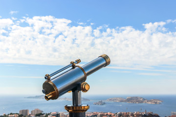 telescope at view point on mountain top in Marseille