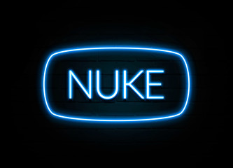 Nuke  - colorful Neon Sign on brickwall