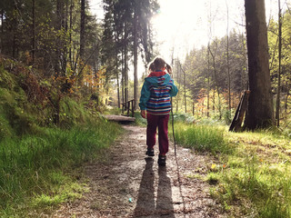 Family hike in autumn forest in Rheinland Pfalz