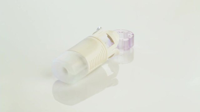 Precision medical plastic parts on white background