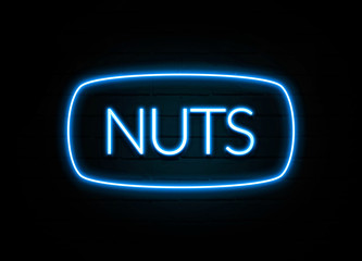 Nuts  - colorful Neon Sign on brickwall