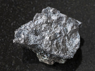 rough Magnetite ore on dark background