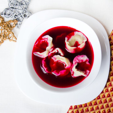 Red borsch with dumplings, traditional Polish Christmas Eve dish
