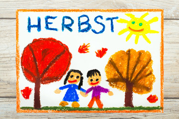 Obraz na płótnie Canvas Photo of colorful drawing: German word Autumn, trees with red and orange leaves and smiling people,