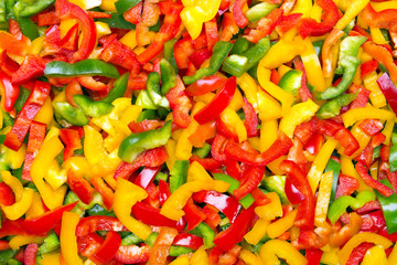 Fresh colorful  cut bell peppers texture for background - obrazy, fototapety, plakaty