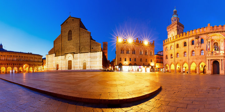 Panorama of Piazza Maggiore square with Basilica di San Petronio and Palazzo d'Accursio or Palazzo Comunale at night, Bologna, Emilia-Romagna, Italy