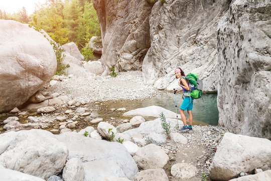 Woman backpacker on hike in Goynuk Canyon at Lycian Way, Turkey