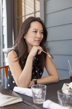 Woman sitting at cafe