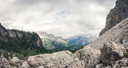 Fototapeta premium View from Forcella Formin at Croda da Lago on a cloudy day. Cortina D'Ampezzo, Dolomites, Italy