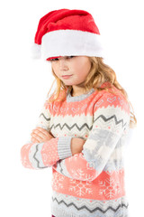 Pre-teen girl wearing a santa hat