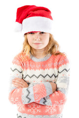 Pre-teen girl wearing a santa hat