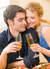 Cheerful couple with champagne
