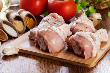 Raw chicken legs with spices