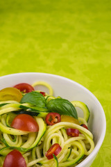 vegetarian zucchini noodles with cherry tomatoes and pepper