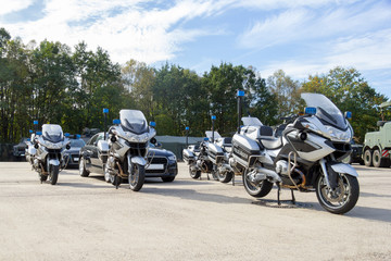 german feldjaeger, military police motorcycles and vehicles stands in formation