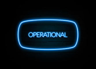 Operational  - colorful Neon Sign on brickwall