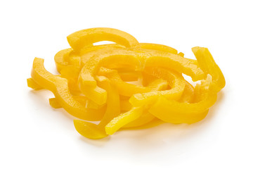 Sliced yellow bell pepper, close-up, isolated on white background.
