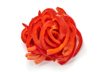 Sliced red bell pepper, top view, isolated on white background.