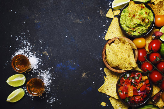 Tex-Mex Concept, Nachos, Guacamole, Salsa Sauce and Tequila, Food Background, Top View