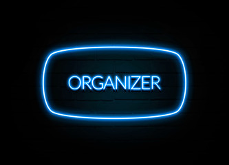 Organizer  - colorful Neon Sign on brickwall