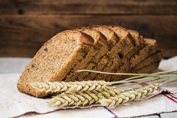 bread wheat spike on wooden background