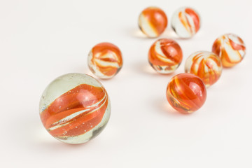 group of glass marbles in red