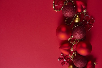 Red christmas decoration on red background. Design mockup