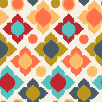 Seamless vector pattern with bright ikat background. 