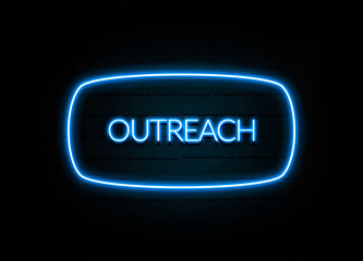 Outreach  - colorful Neon Sign on brickwall