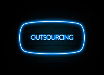 Outsourcing  - colorful Neon Sign on brickwall