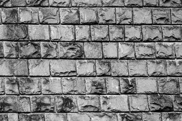 old wall, lined with a stone of black color