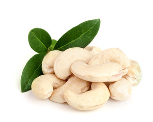 cashew nuts with leaf isolated on white background. macro