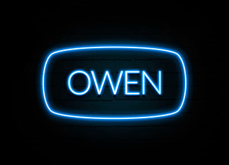 Owen  - colorful Neon Sign on brickwall