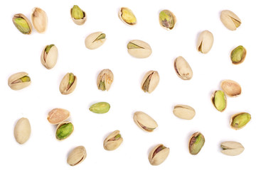 Pistachios isolated on white background, top view. Flat lay pattern