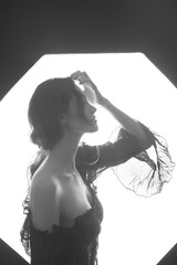 white Caucasian Jewish female model posing in studio in lingerie and veil