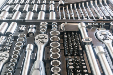 Sockets, tools, wrenches, spanners and bits in a chrome vanadium socket set.