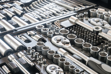 Sockets, tools, wrenches, spanners and bits in a chrome vanadium socket set.