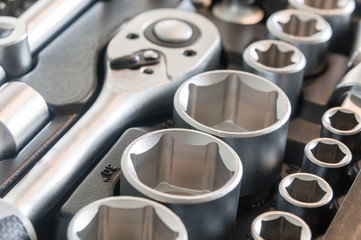Sockets, tools, wrenches, spanners and bits in a chrome vanadium socket set.