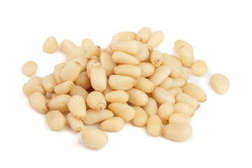 Shelled cedar pine nuts isolated on white background