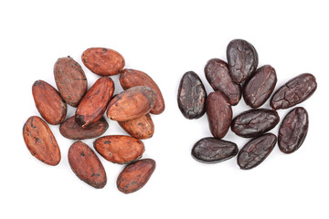 peeled and unpeeled cocoa beans isolated on white background close-up top view