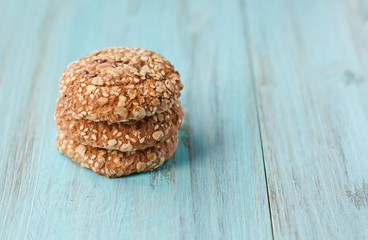 Oatmeal cookies on a wooden background, sweet pastries, a menu for a bakery. Close-up