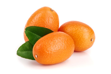 Cumquat or kumquat with leaf isolated on white background close up